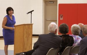 Candidate for County Commission Diane Hamby speaking at the ribbon cutting ceremony